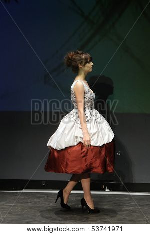 ZAGREB, CROATIA - NOVEMBER 07: Fashion model wearing clothes designed by Mitak and Gregl on the Fashion Wardrobe show on November 07, 2013 in Zagreb, Croatia.