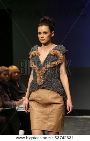 ZAGREB, CROATIA - NOVEMBER 07: Fashion model wearing clothes designed by Radetic and Topalovic on the Fashion Wardrobe show on November 07, 2013 in Zagreb, Croatia.
