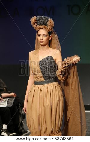ZAGREB, CROATIA - NOVEMBER 07: Fashion model wearing clothes designed by Radetic and Topalovic on the Fashion Wardrobe show on November 07, 2013 in Zagreb, Croatia.