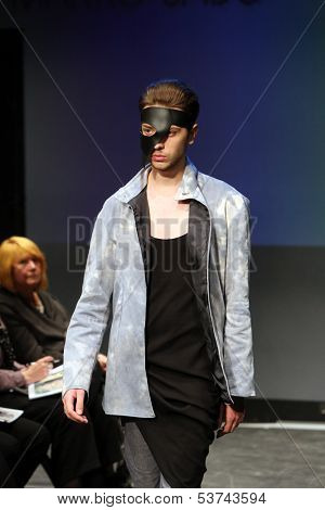 ZAGREB, CROATIA - NOVEMBER 07: Fashion model wearing clothes designed by Marko Sabo on the Fashion Wardrobe show on November 07, 2013 in Zagreb, Croatia.