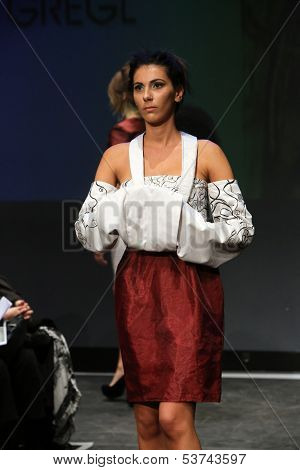 ZAGREB, CROATIA - NOVEMBER 07: Fashion model wearing clothes designed by Mitak and Gregl on the Fashion Wardrobe show on November 07, 2013 in Zagreb, Croatia.