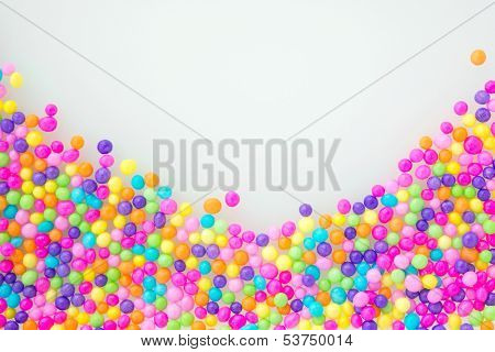 Sugar sprinkle dots, on natural white background, decoration for confectionery. High magnification macro. 