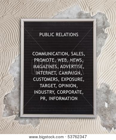 Public Relations Concept In Plastic Letters On Very Old Menu Board