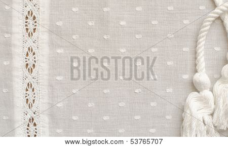White fabric with a strip of lace