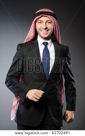 Arab businessman againt grey background