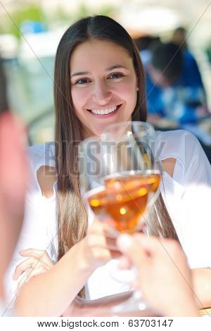 happy young couple having lanch at beautiful restaurant on by the sea on  beach