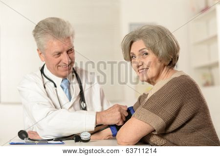 Elderly woman and doctor