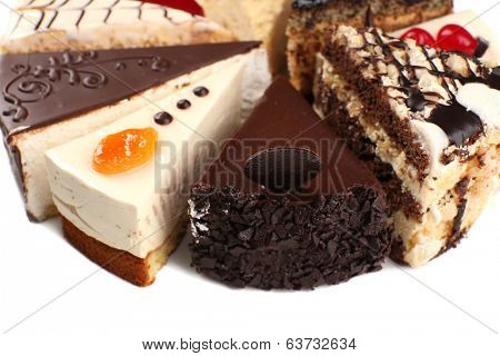 Assortment of pieces of cake, isolated on white