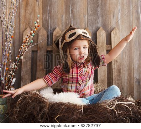 Happy Kid Playing In Pilot Helmet