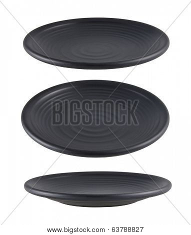 Black plate isolated on white background with different angle of view
