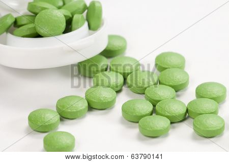 Green Tablets Near The Box