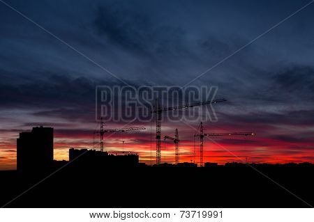 sky at sunset with cityscape panorama