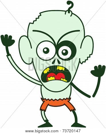 Angry Halloween zombie feeling furious and protesting