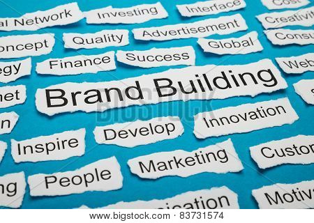 Word Brand Building On Piece Of Torn Paper