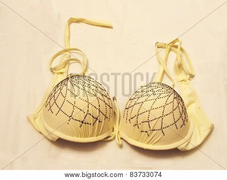 Light Yellow Bra Isolated On The White Background