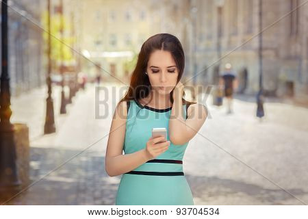 Curious Girl Looking at Her Phone