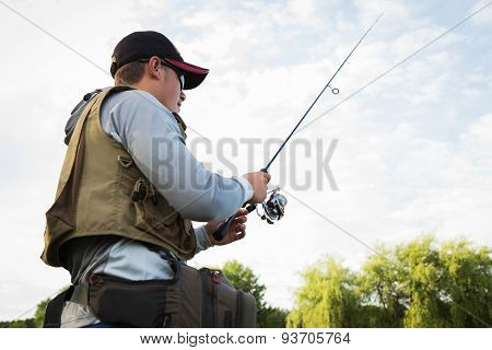Fisherman on the river bank.