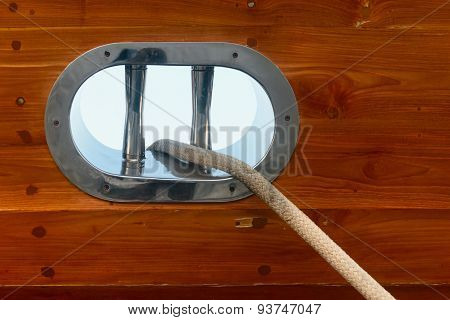 Stainless Steel Fairlead On A Wooden Yacht