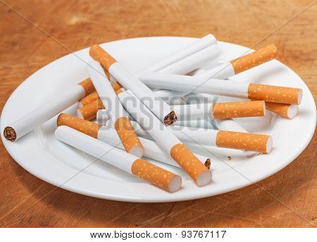 Many Cigarettes On The Plate