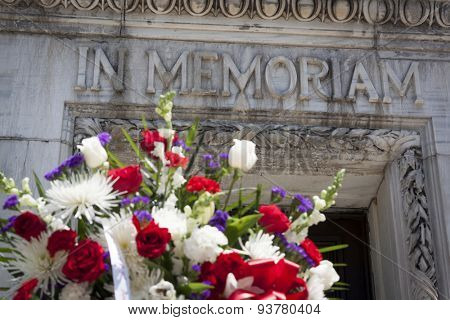 NEW YORK - MAY 25 2015: The words In Memoriam carved in the marble of the Soldiers and Sailors Monument with a wreath in the foreground on Memorial Day Observance service during Fleet Week NY 2015.