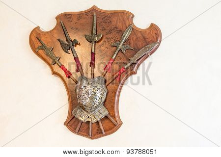Decorative halberds and armor on the wall