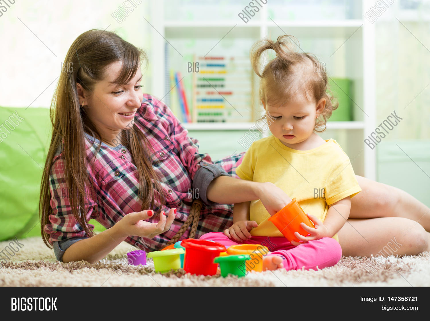 kid babysitter playing image photo free trial bigstock kid babysitter