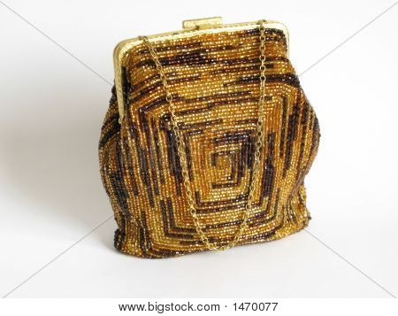 Borsa con catena di perline di vetro nero e giallo.