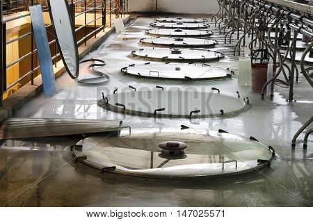 Clean stainless steel vessels in a winery