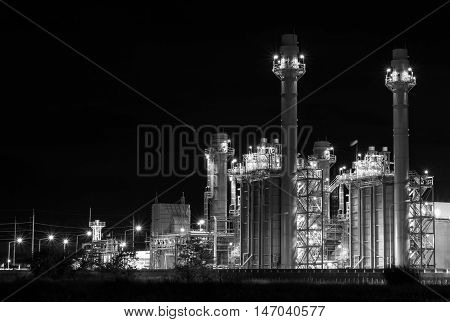 Gas turbine electrical power plant at dusk ( black white )