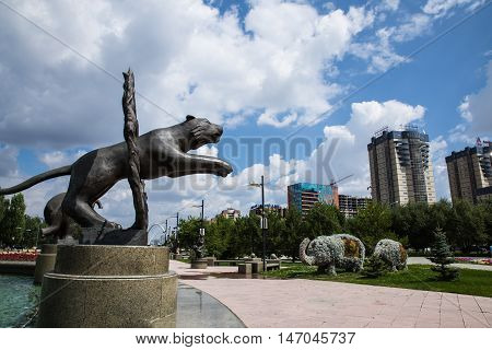 Astana, Kazakhstan, 27.08.2016 Animal statue jumping through the fire near the Circus