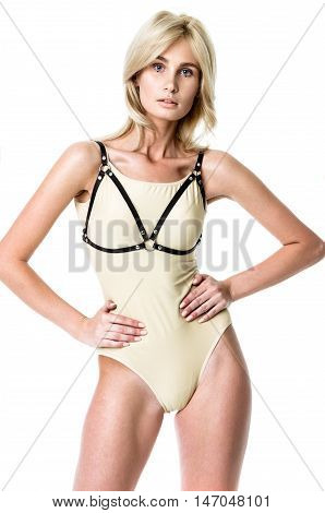 Blonde girl wearing bodysuit and black leather belt