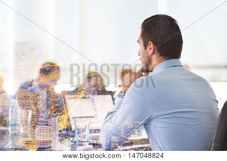 Corporate business meeting in office. Business executive giving instructions to his colleagues. Explaining business plans to employees. Business team concept. Business and Entrepreneurship.