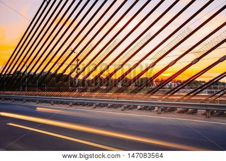 Shrouds Of Vansu Bridge, formerly Gorky Bridge, In Riga, Latvia. Shroud Bridge. Summer Evening With Blue. 595 Meters In Length. Vansu Bridge - One Of The Symbols Of Modern Riga