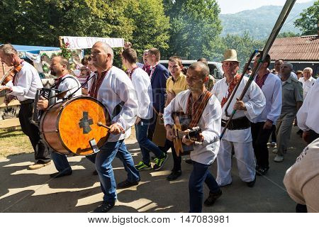 4 September 2016. Rakhiv Transcarpathian region Ukraine. Celebration - Festival Hutsul brynza . Colorful procession - parade of people dressed in national costumes. Folk ensemble