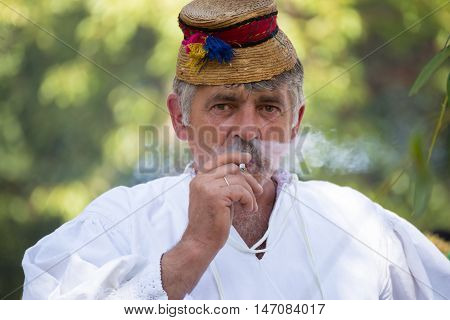 4 September 2016. Rakhiv Transcarpathian region Ukraine. Celebration - Festival Hutsul brynza - shepherds and sheep return from mountains. Man in national Huzul headdress