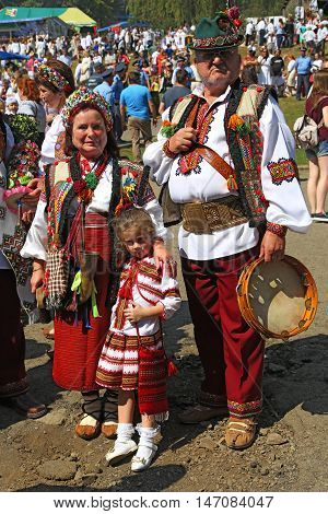4 September 2016. Rakhiv Transcarpathian region Ukraine. Celebration - Festival Hutsul brynza - parade of people dressed in national costumes. Family
