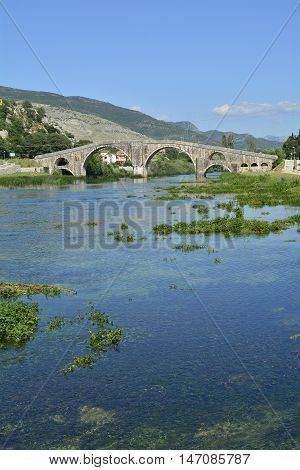 Arslanagica Most over Trebisnjica River in Trebinje Bosnia also known since 1993 as Perovica Bridge. Built by Ottomans in 1574 it was moved and physically rebuilt in 1970 a few kilometres from its orginal location.