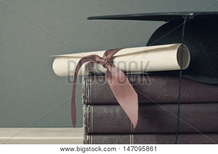 Graduation Cap, Scroll And Books - Faded Tones