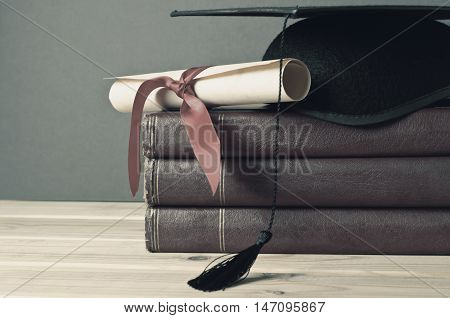 Graduation Mortarboard, Scroll And Books - Faded Tones