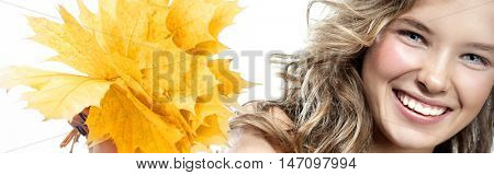 beauty closeup portrait of attractive  caucasian smiling woman  isolated on white studio shot lips toothy smile face hair looking at camera teeth hand holding yellow marple autumn leaves