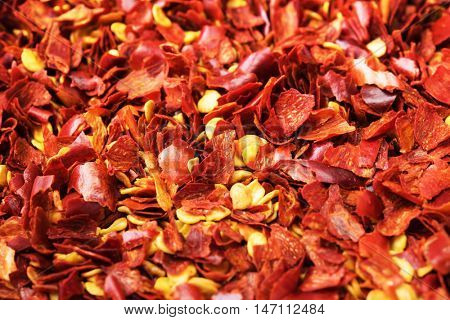 Crushed red pepper, close-up, with depth. Shallow depth of field. 
