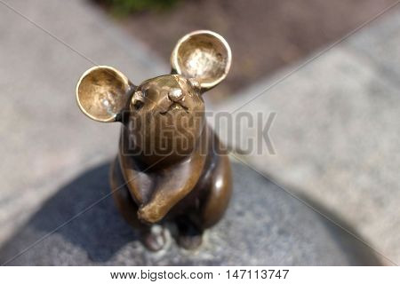 LITHUANIA, KLAIPEDA - MAY 25, 2014: Sculpture Wonderful little mouse is oldtown Klaipeda. Lithuania. One of the most famous sculptures in the city.