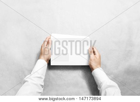 White blank envelope mockup hold in hands. Empty letter with transparent window design mock up. Message template presentation. Person open clear mail.