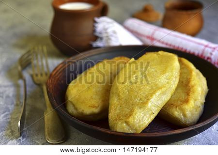Fried Zeppelin (cepelinai) - Tradishional Lithuanian Potato Patty Stuffed With Meat.