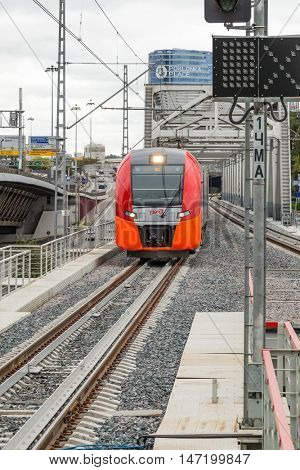 MOSCOW, RUSSIA - SEPTEMBER 13, 2016: Central Circle Line MCC Lastochka train at the station Delovoj centr