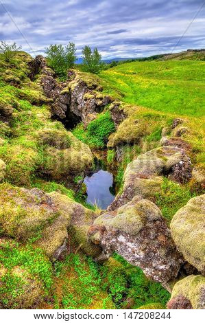 Water in a fissure between tectonic plates in the Thingvellir National Park - Iceland