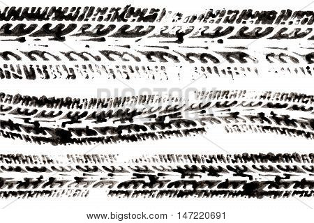 three tire tracks made with ink isolated on white
