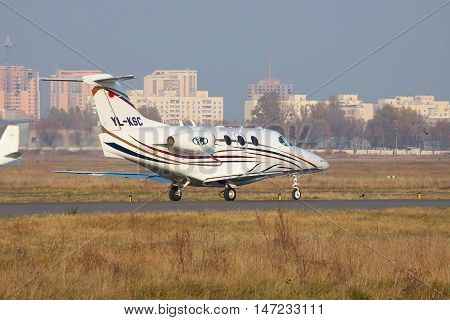 Kiev Ukraine - November 5 2011: Raytheon 390 Premier business jet is taking off from the airport