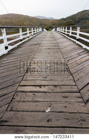 Wooden structure Penmaenpool toll bridge over the River Mawddach near Dolgellau Wales United Kingdom