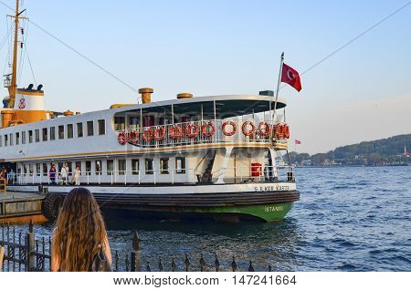 Istanbul Turkey - October 2 2012: Ferry in Karakoy pier. Istanbul Ferries continue to serve as a key public transport link for many Thousands of commuters tourists and vehicles per day.